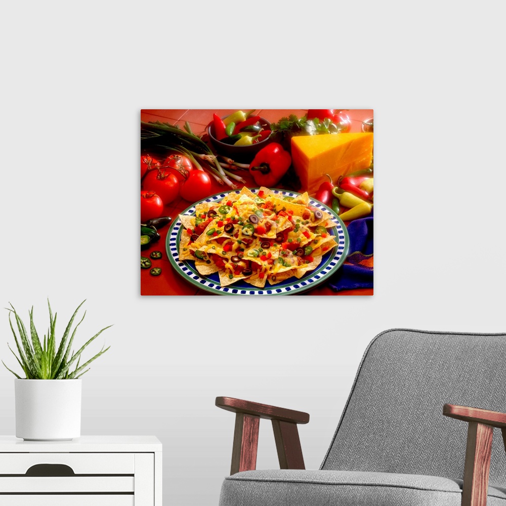 A modern room featuring Horizontal photograph on a big canvas of a plate of loaded nachos, the fresh ingredients used on ...