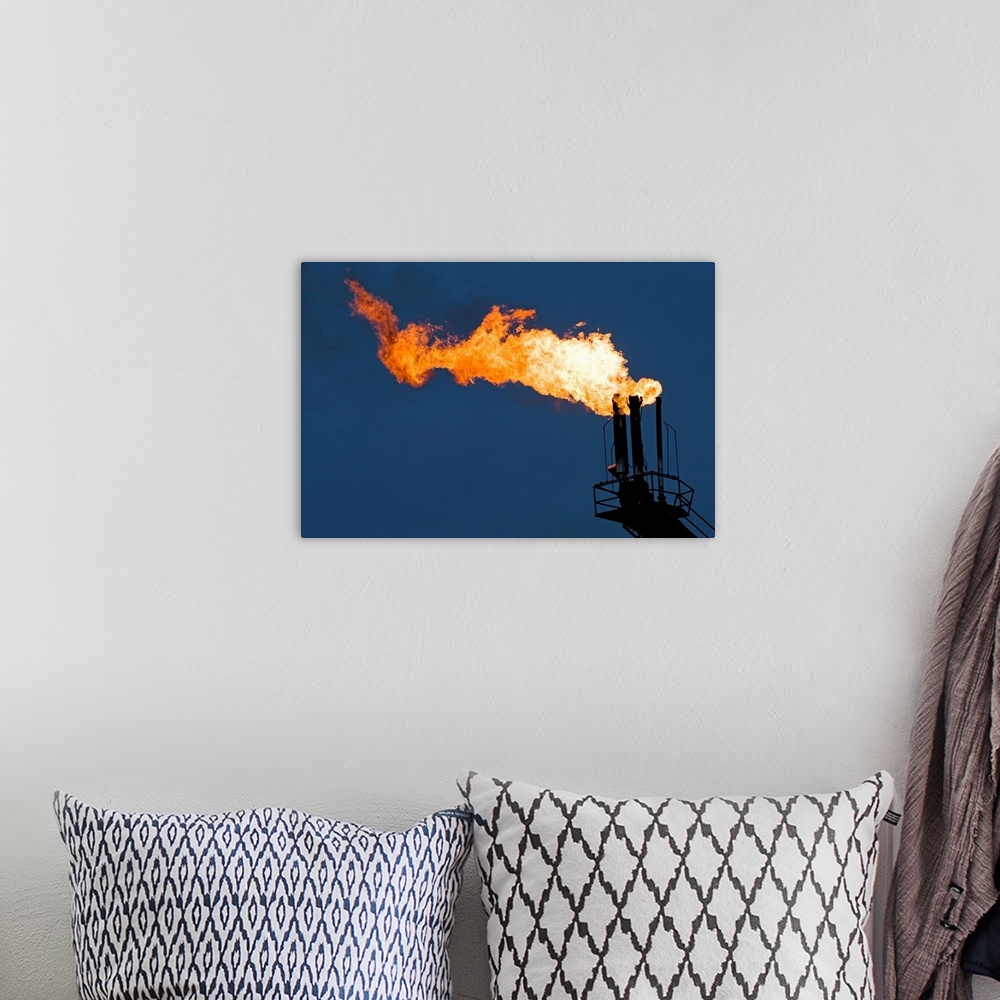 A bohemian room featuring Natural gas flare from an offshore oil rig in Cook Inlet, Alaska.
