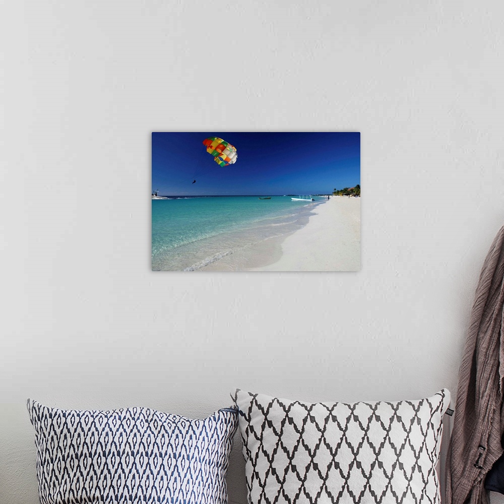 A bohemian room featuring Parasailing off Negril's Seven Mile Beach.