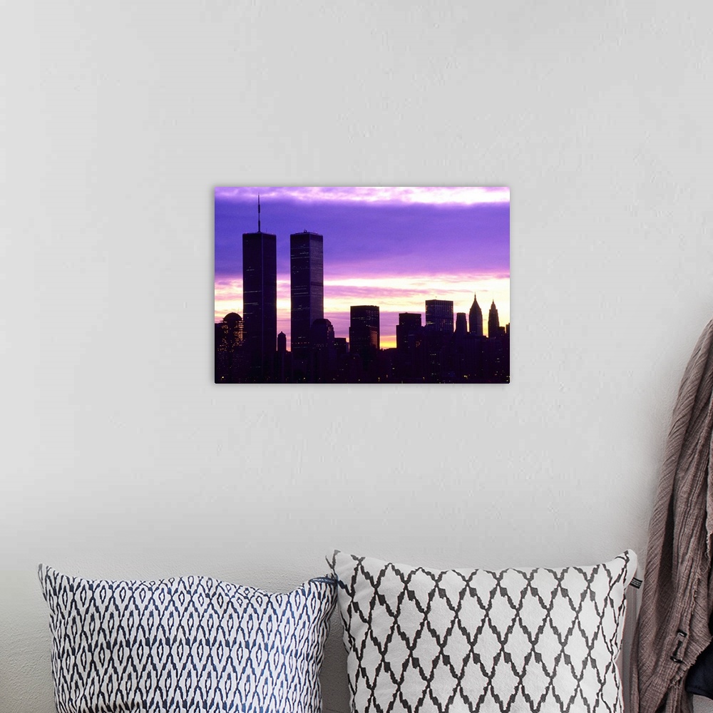 A bohemian room featuring New York City at dusk