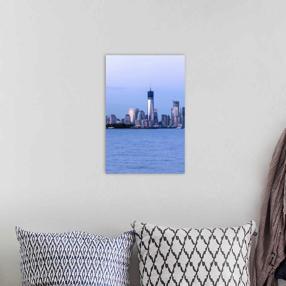 A bohemian room featuring New York City skyline with the new World Trade Center under construction.