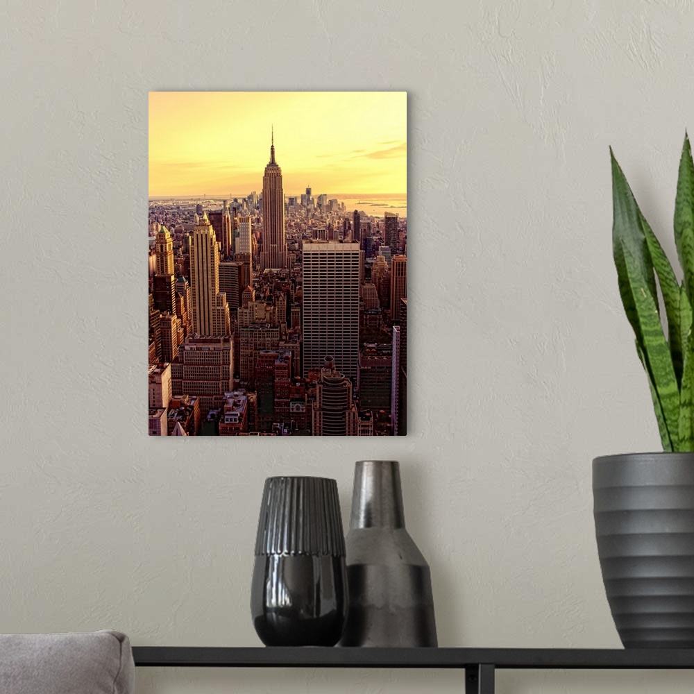 A modern room featuring Vertical Panoramic photograph of the "Big Apple" at sunset.