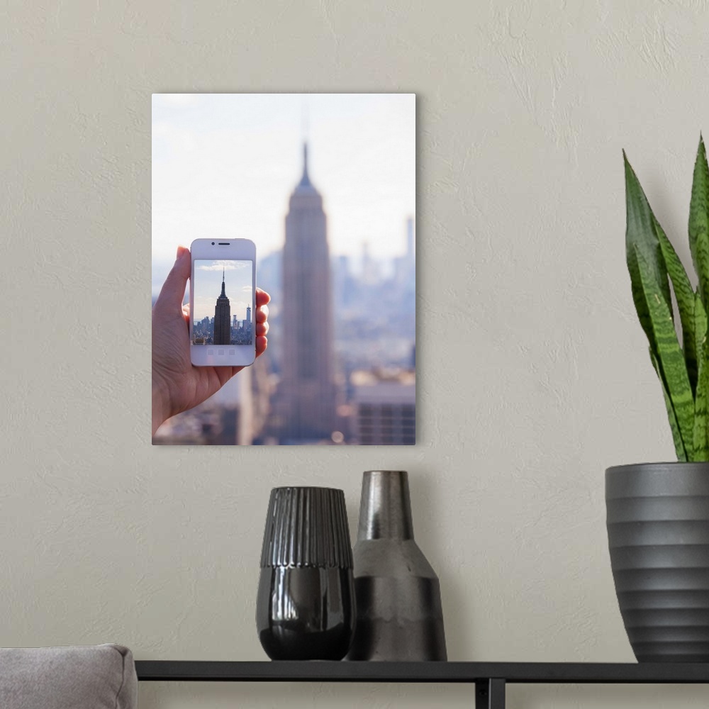 A modern room featuring USA, New York State, New York City, Manhattan, Tourist taking photo of Empire State Building