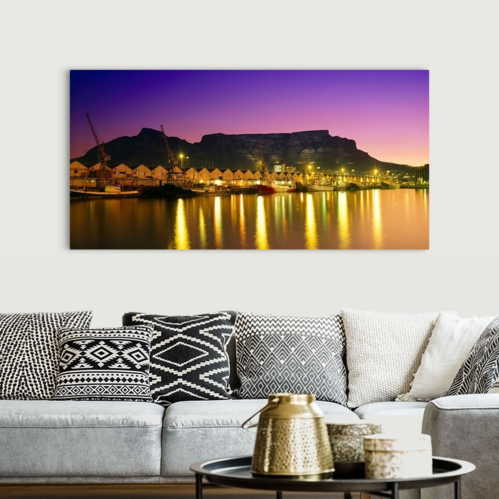 A bohemian room featuring Night lights of Cape Town Harbour at sunset. V