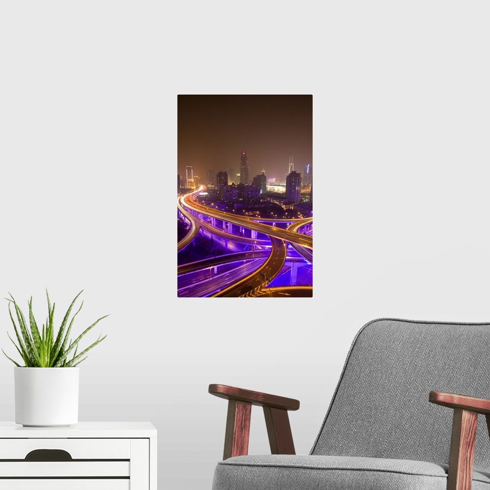 A modern room featuring Night Shot of Urban Highways Intersection