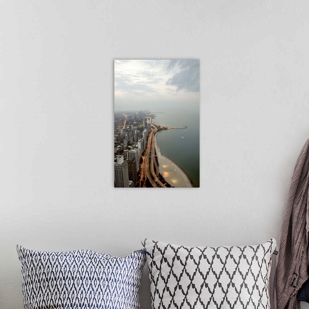 A bohemian room featuring Night view of lake Michigan and Chicago skyline.
