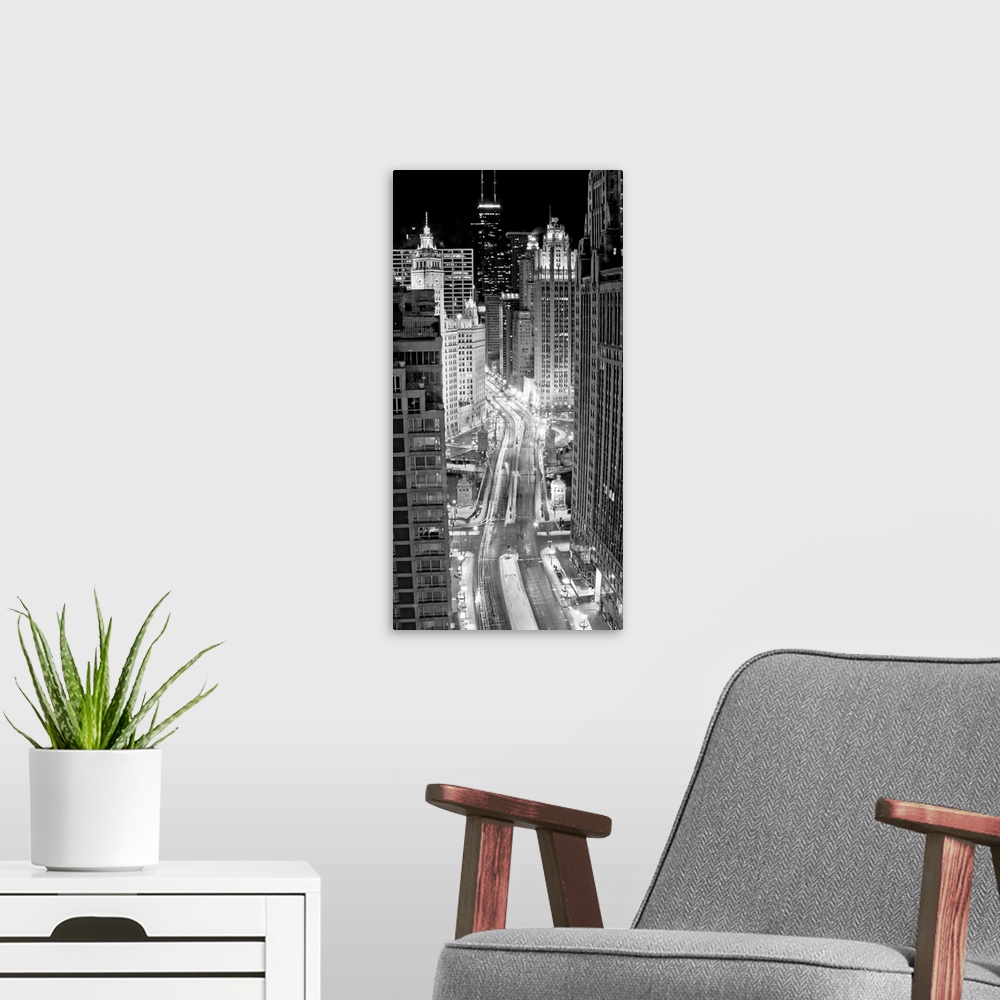 A modern room featuring Panoramic monochromatic photographic from an aerial view looking through the downtown streets of ...
