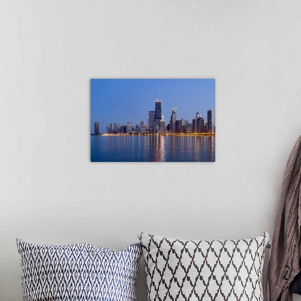 A bohemian room featuring Northern section of the downtown Chicago skyline at dusk.