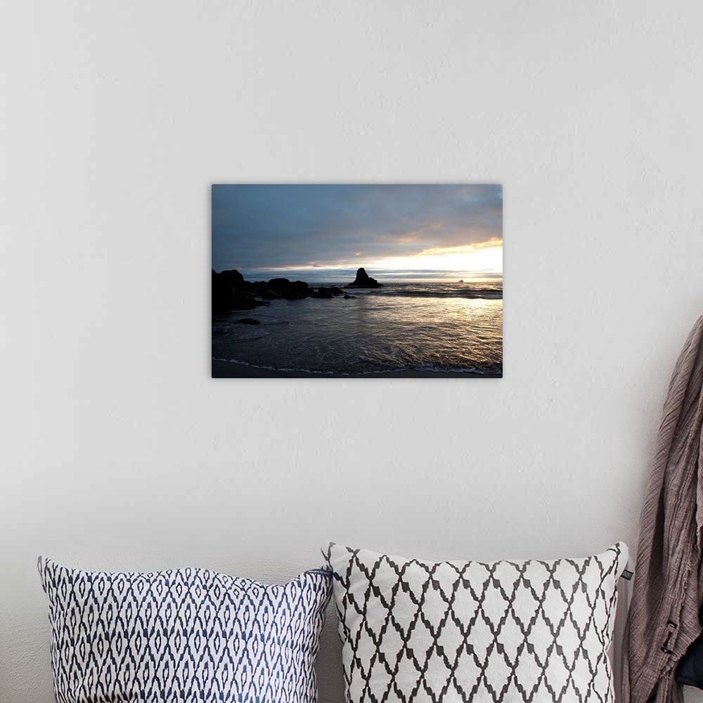 A bohemian room featuring Ocean sunset silhouettes lighthouse