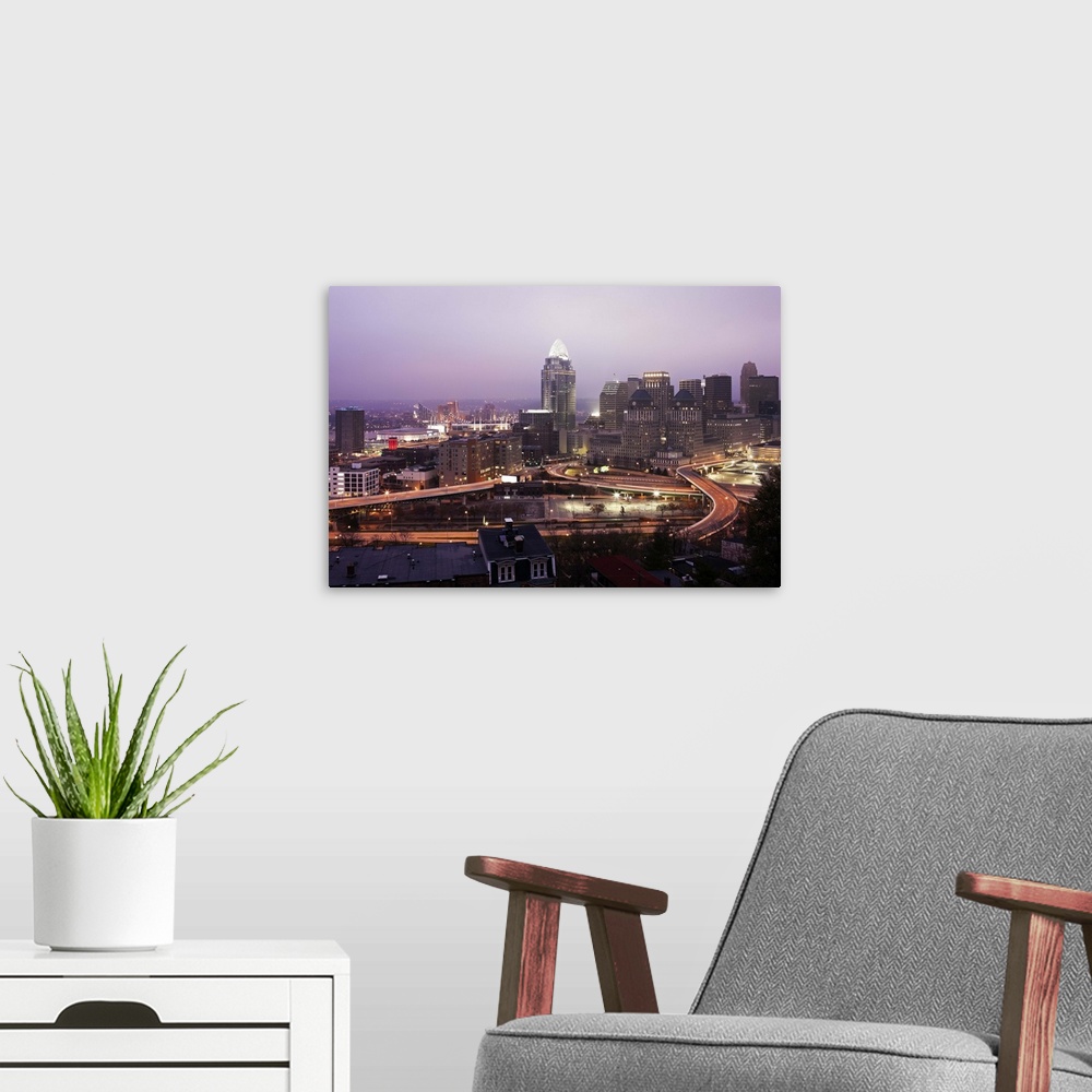 A modern room featuring USA, Ohio, Cincinnati skyline at dawn