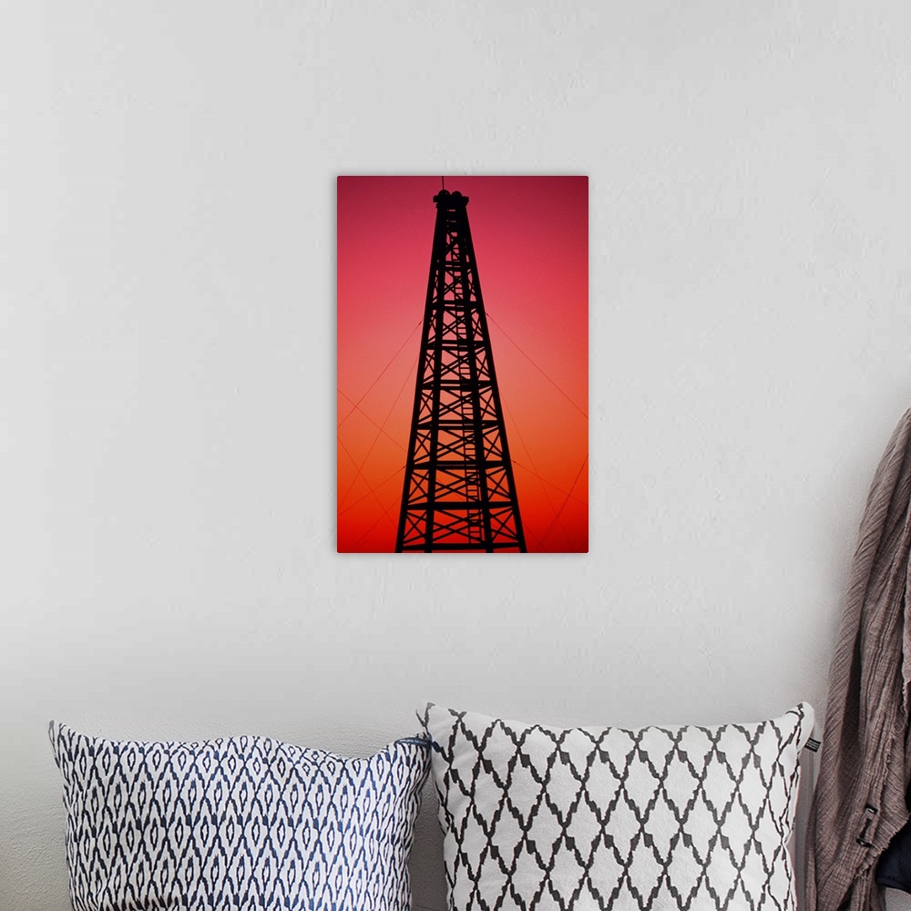 A bohemian room featuring Oil drilling rig at sunset