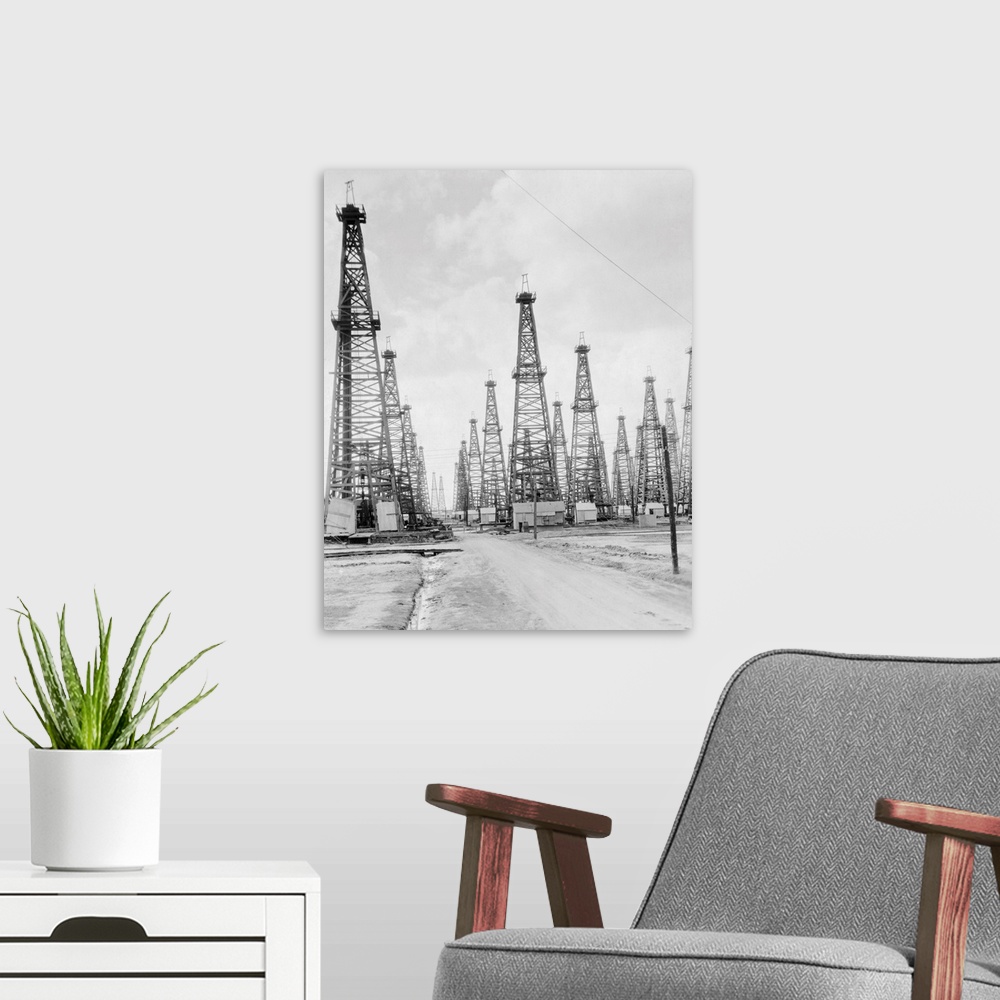 A modern room featuring U.S.A. Texas Beaumont spindle top oil fields.