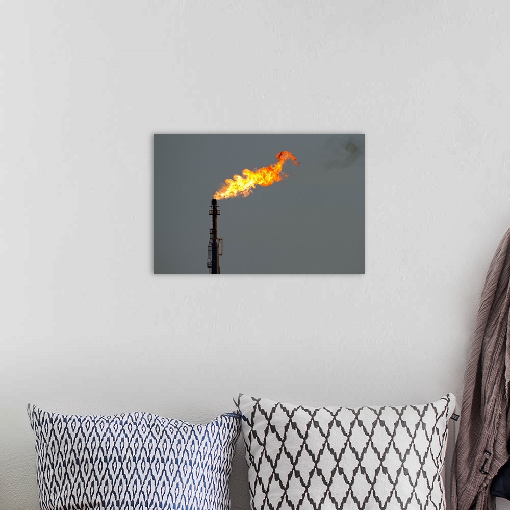 A bohemian room featuring Dutch Antilles, Aruba, Flames billow from natural gas flare at Valero Oil Refinery | Location: Sa...