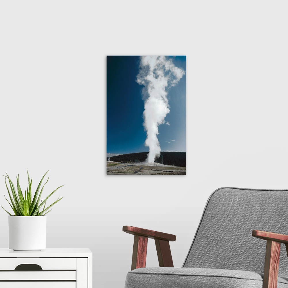 A modern room featuring Old Faithful geyser , Yellowstone National Park , Wyoming