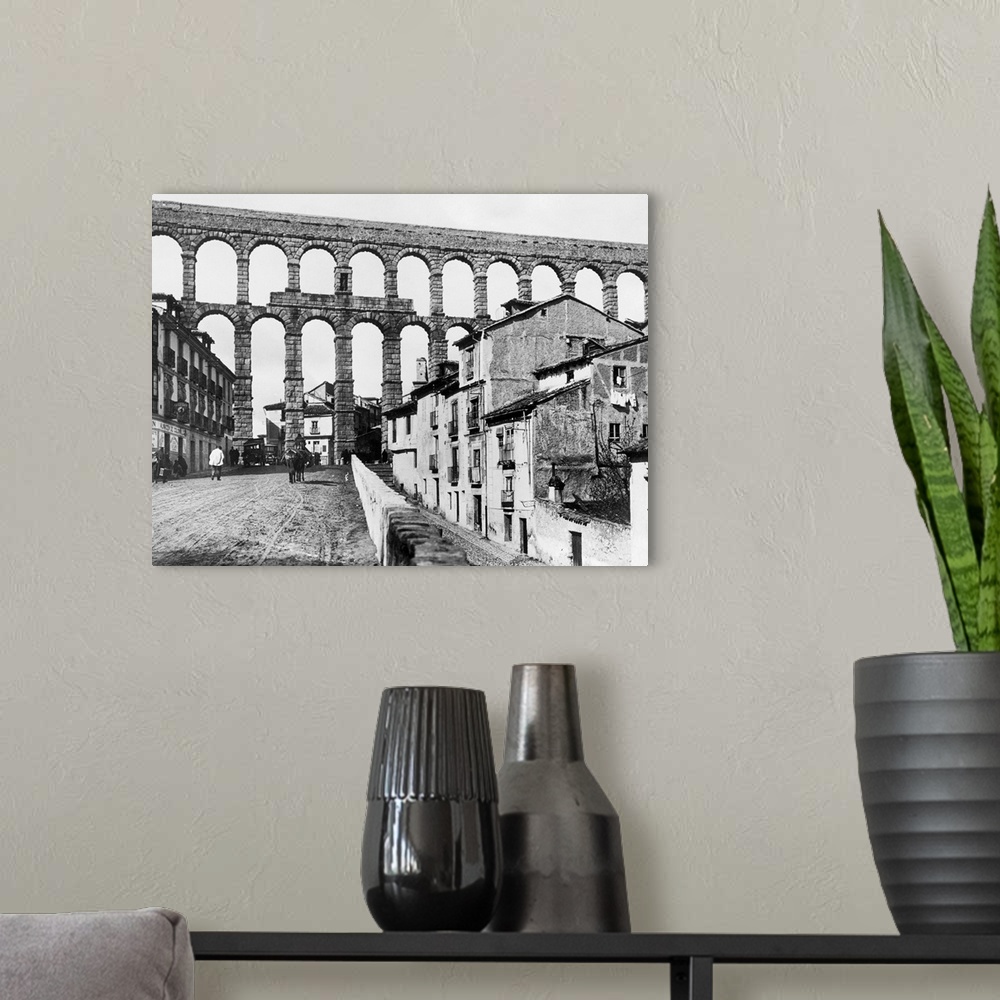 A modern room featuring Open Plumbing 1,900 years old - excellent photo of the magnificent aqueduct at Segovia, Spain, bu...