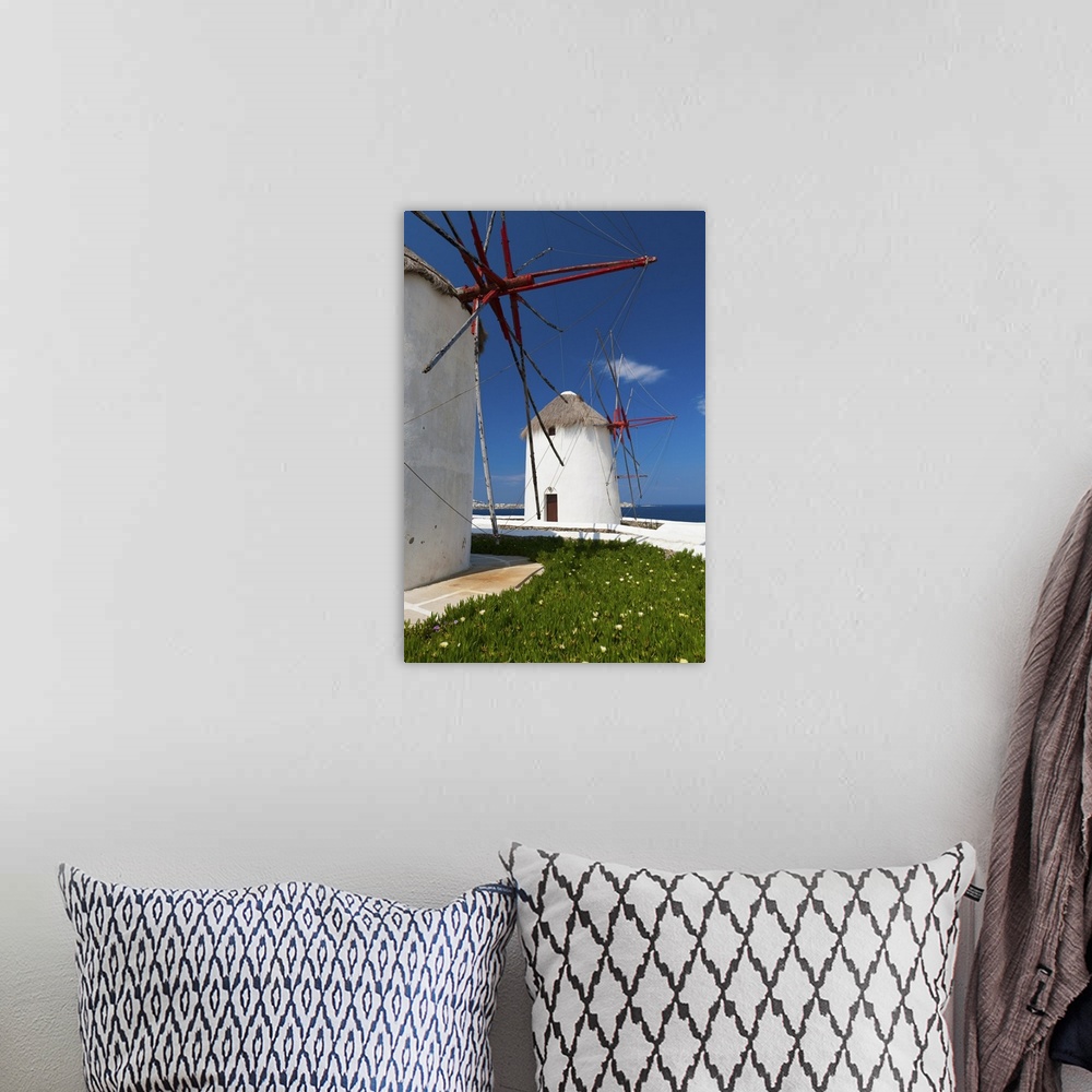 A bohemian room featuring Greece, Cyclades Islands, Mykonos, Old windmills at coast