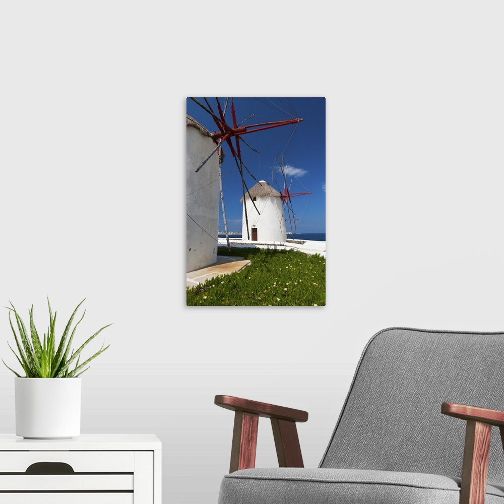 A modern room featuring Greece, Cyclades Islands, Mykonos, Old windmills at coast