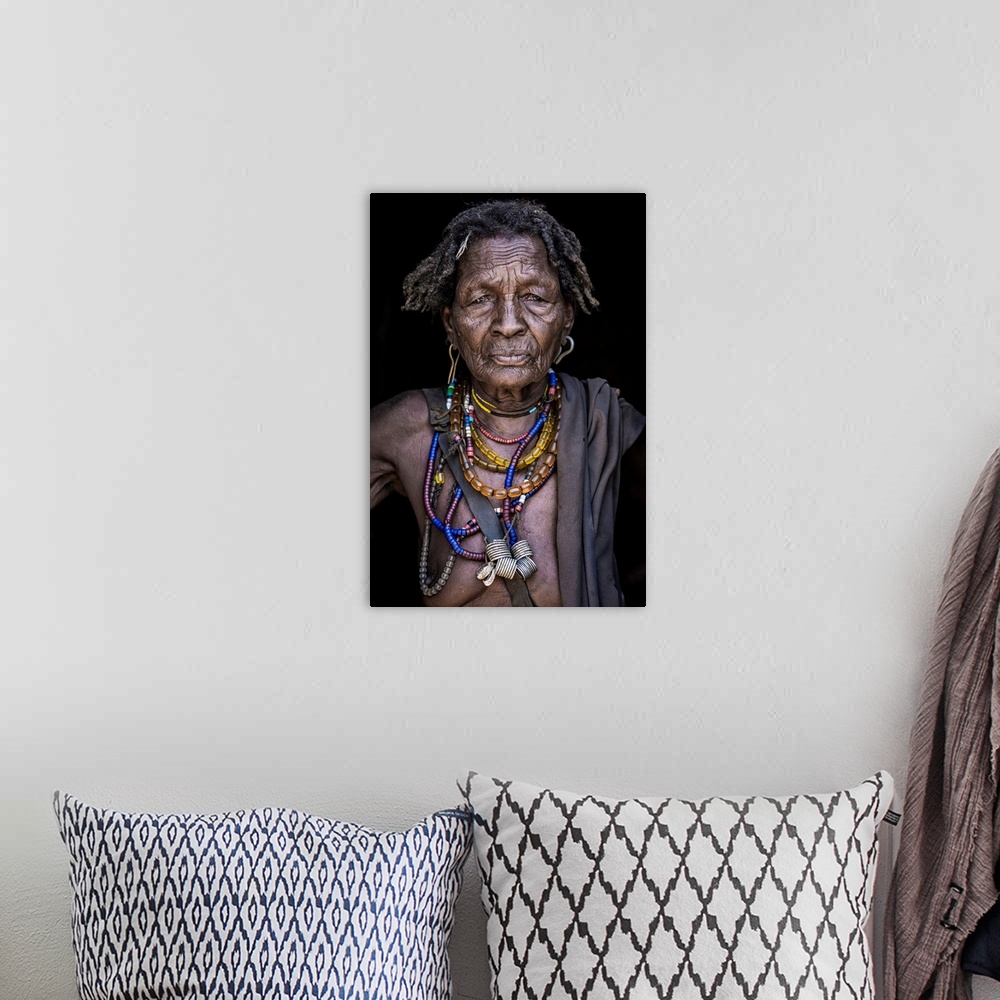 A bohemian room featuring March 19 2019 portrait of an old woman from arbore tribe (Africa) Omo valley, Ethiopia.