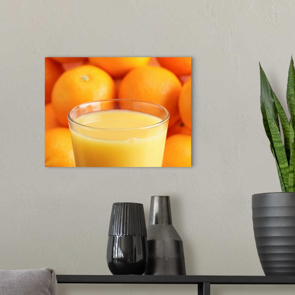 A modern room featuring Orange juice and oranges