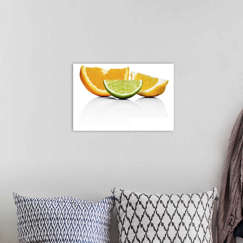 A bohemian room featuring Orange, lime and lemon wedges, on white background, cut out