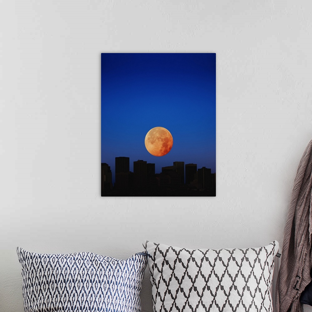 A bohemian room featuring Orange moon in dark sky