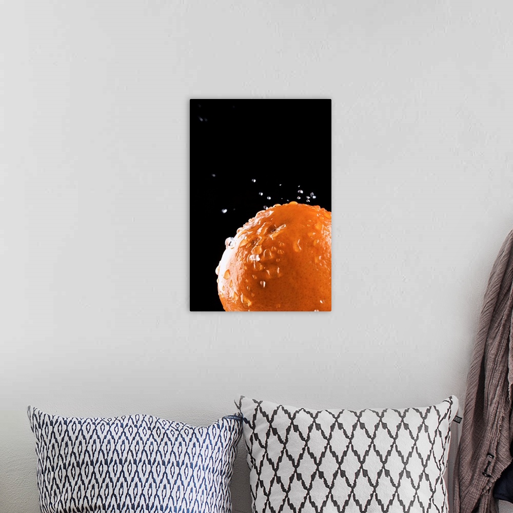 A bohemian room featuring Orange with water droplets splashing