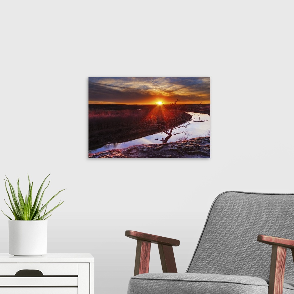 A modern room featuring View from a bluff overlooking the Osage River during sunset with a colorful sunset.