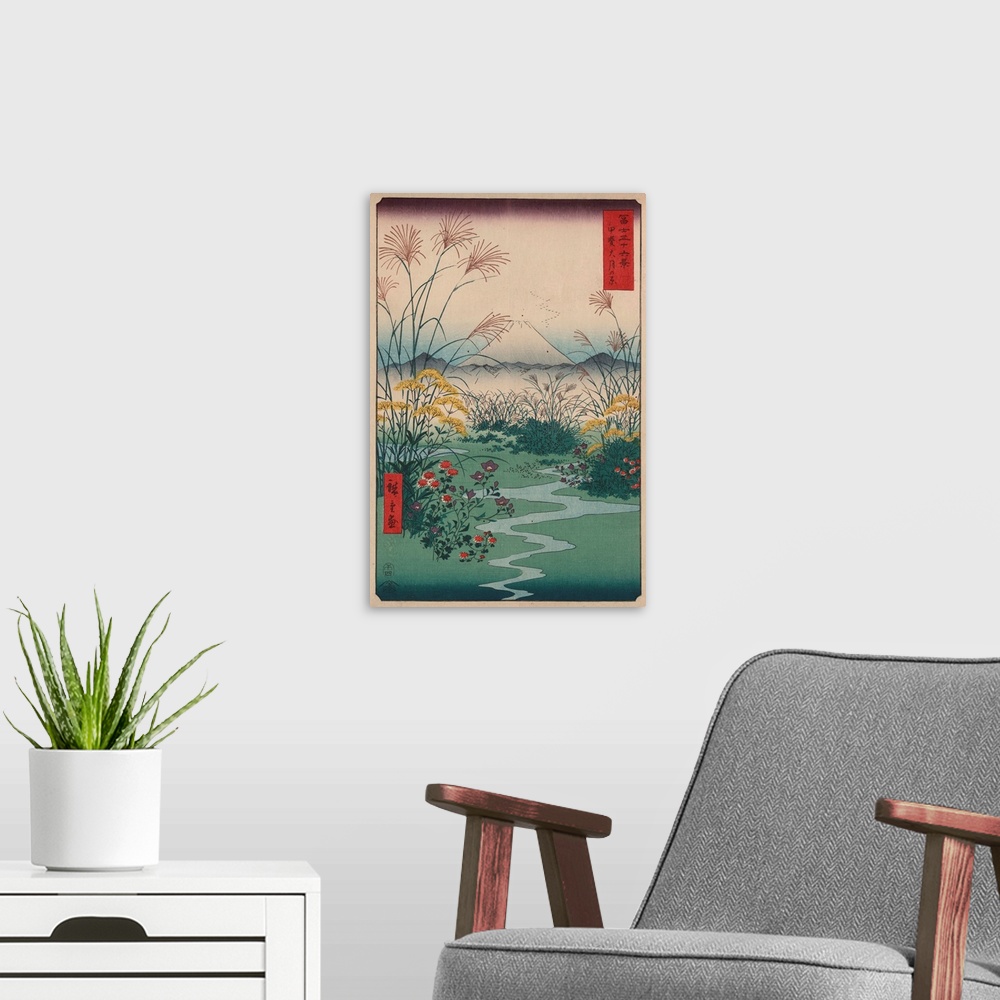 A modern room featuring A print from the series Thirty-Six Views of Mount Fuji by Hiroshige.