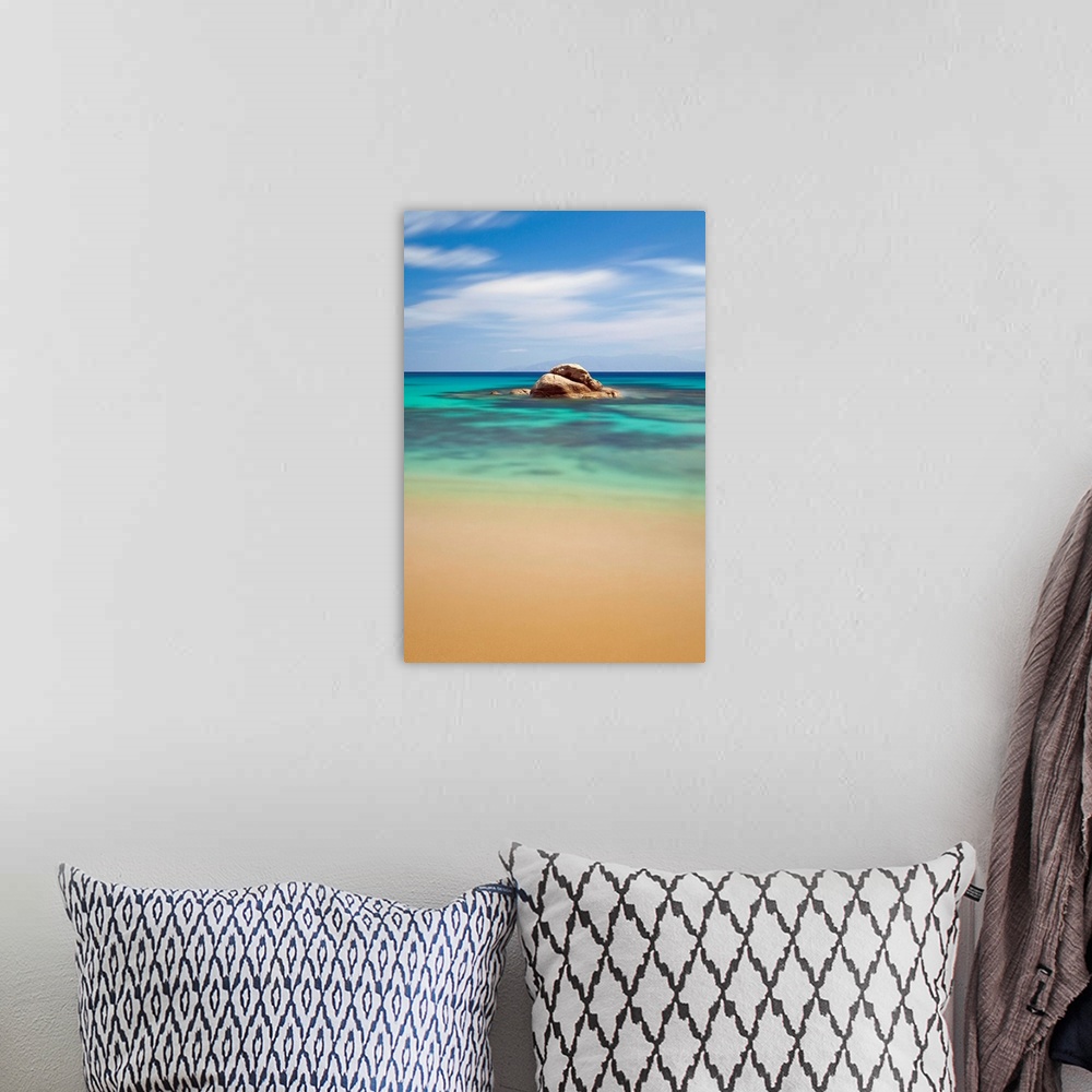 A bohemian room featuring Paranga beach is popular summer spot on Mykonos island.