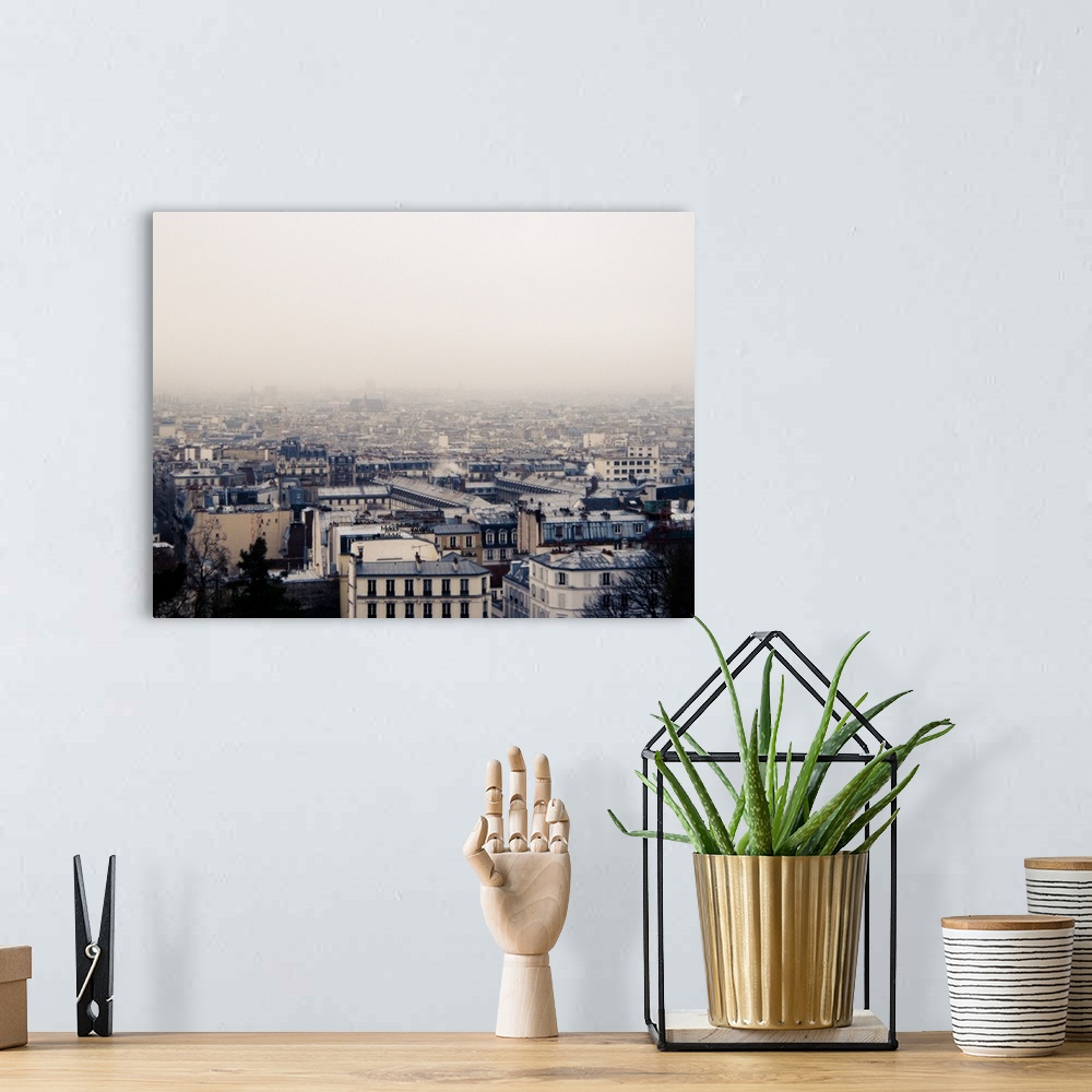 A bohemian room featuring Paris cityscape.