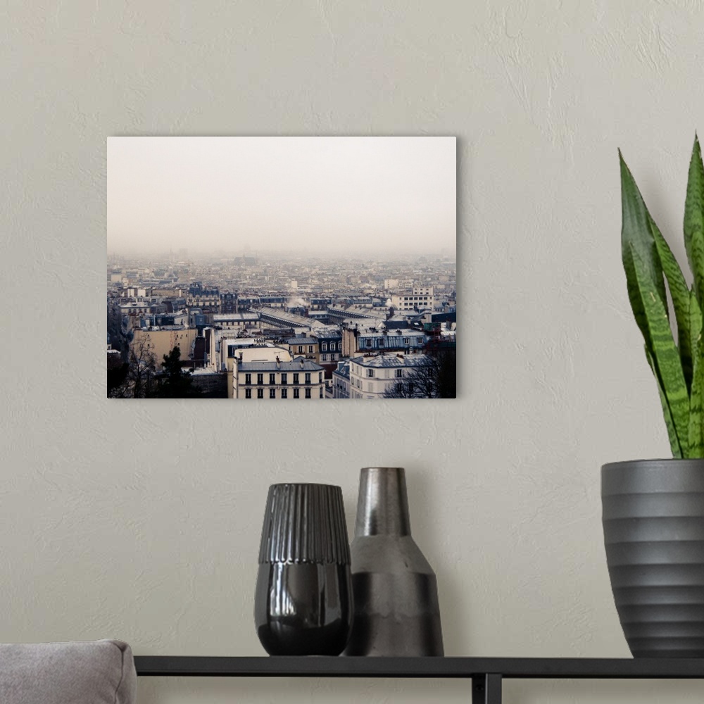 A modern room featuring Paris cityscape.