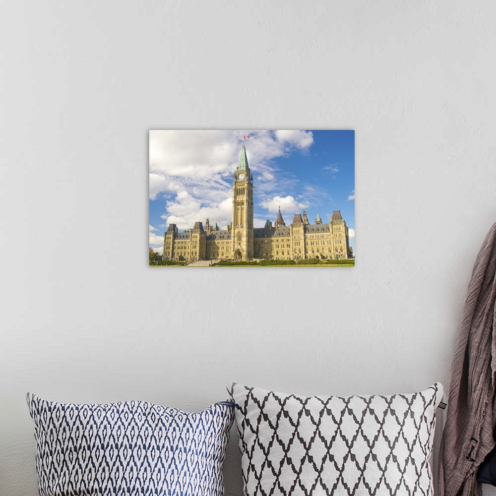 A bohemian room featuring Centre block of Parliament, on Parliament Hill.