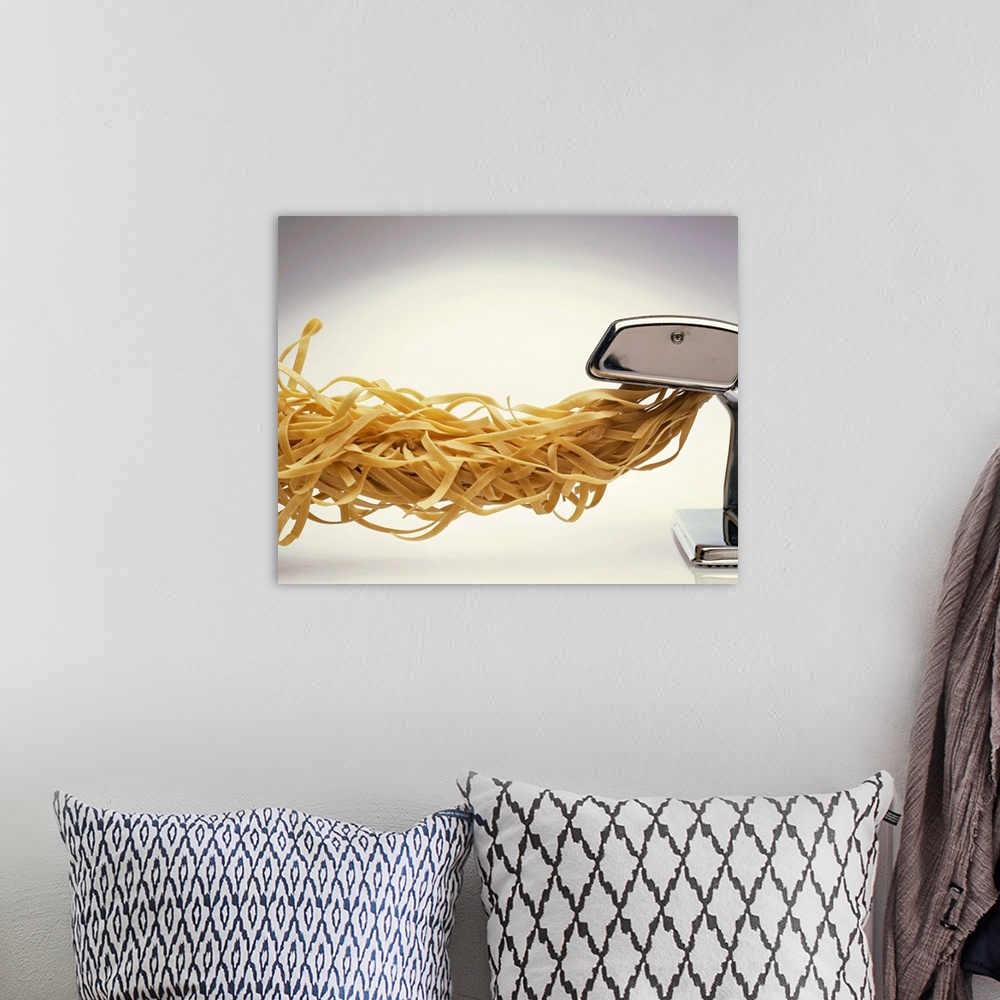 A bohemian room featuring Pasta coming out of pasta machine