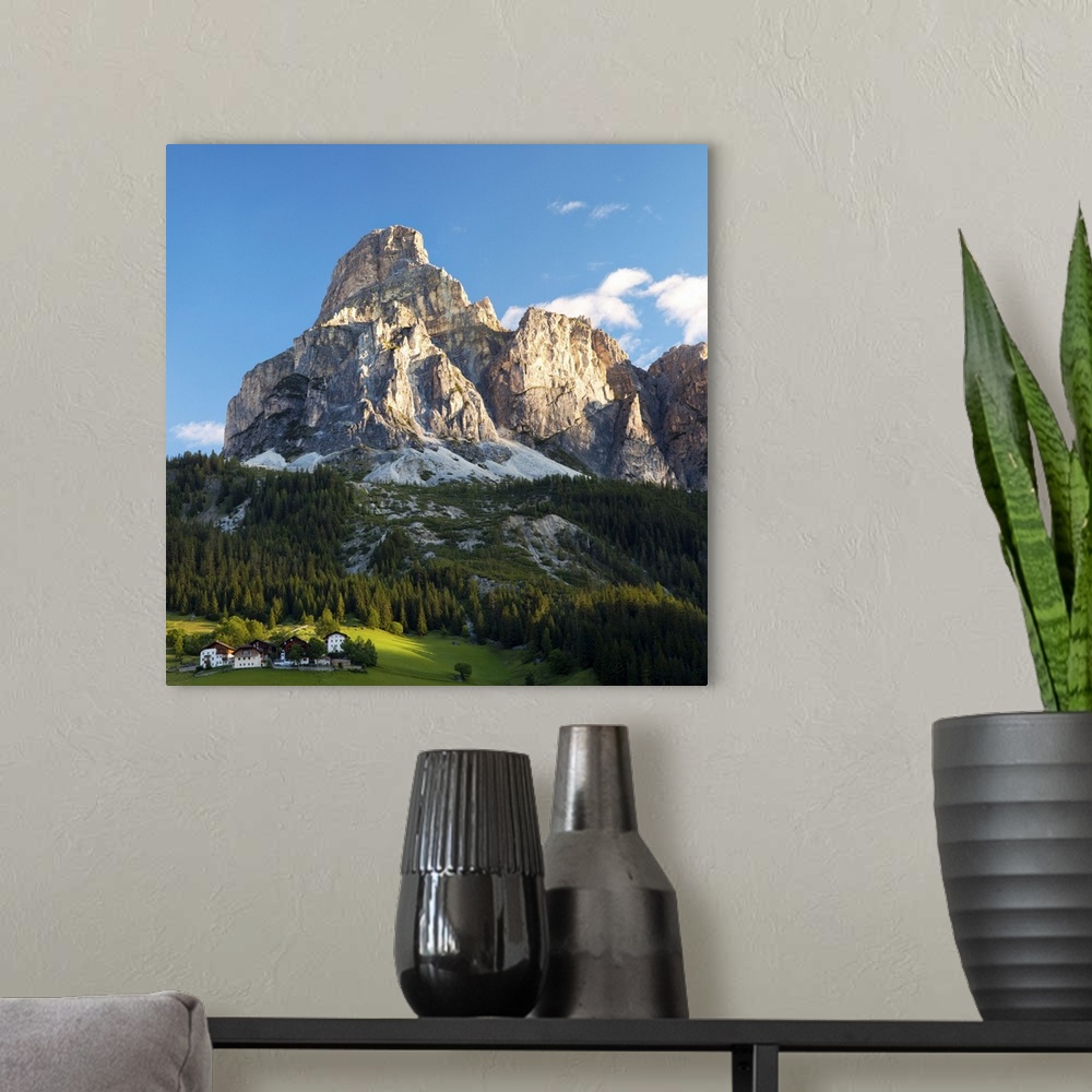 A modern room featuring Peak in Dolomites called Sassongher at sunrise in Corvara in Badia.