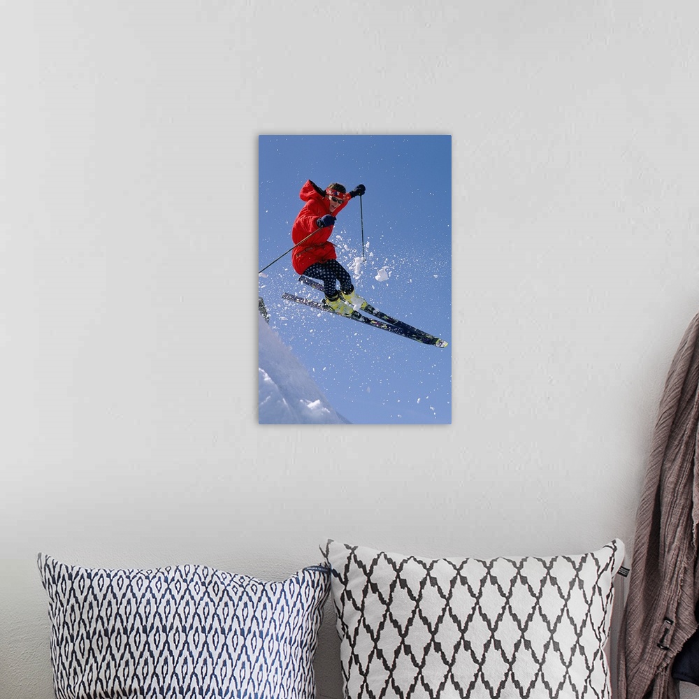 A bohemian room featuring Person downhill skiing  in mid-air