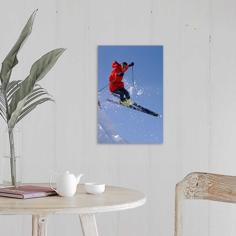 A farmhouse room featuring Person downhill skiing  in mid-air