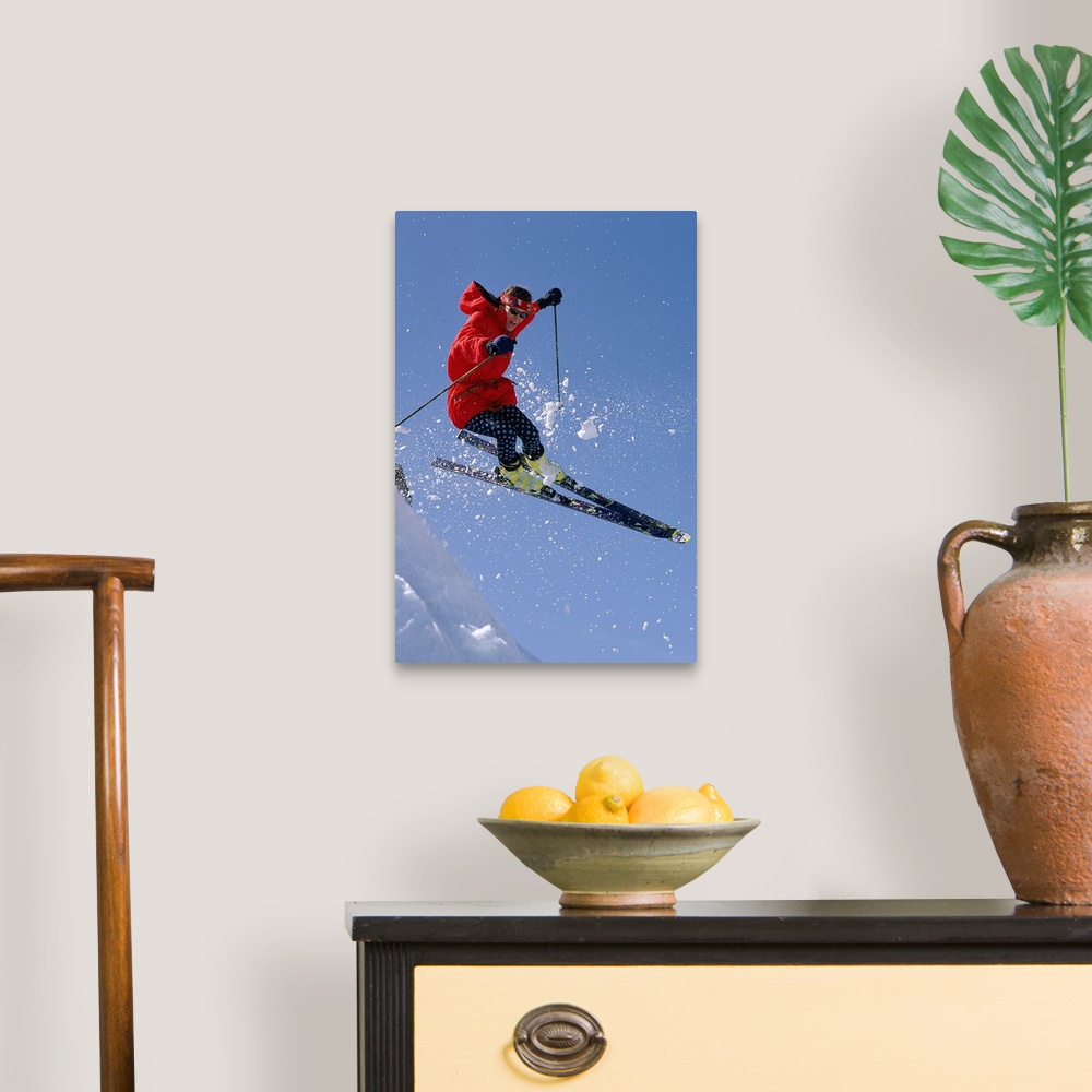 A traditional room featuring Person downhill skiing  in mid-air