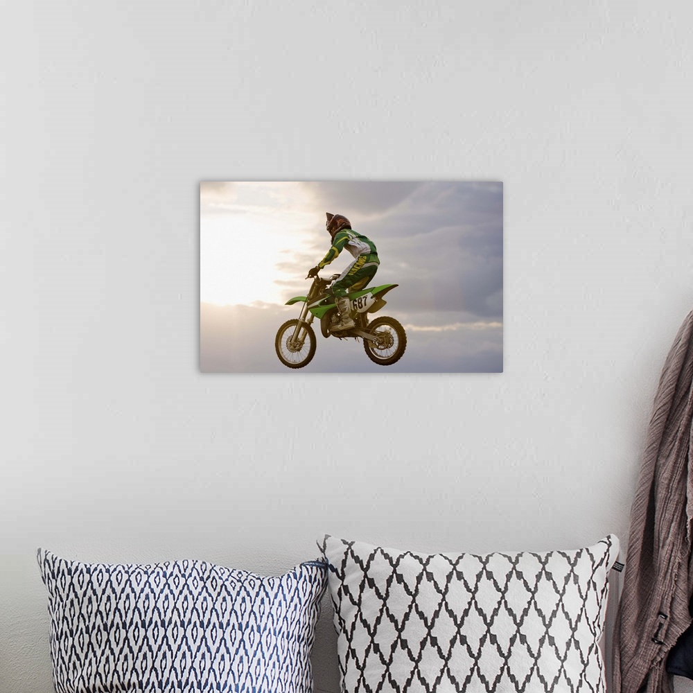 A bohemian room featuring Person riding dirt bike