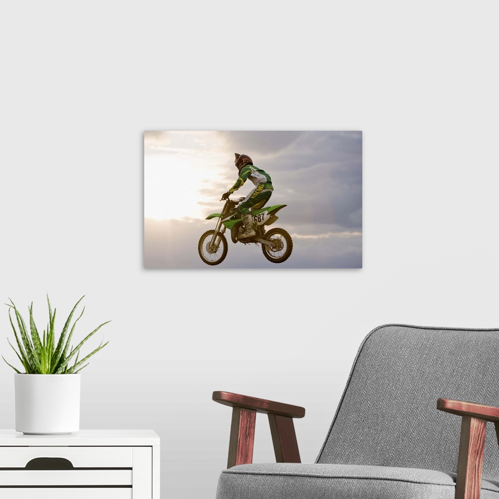 A modern room featuring Person riding dirt bike