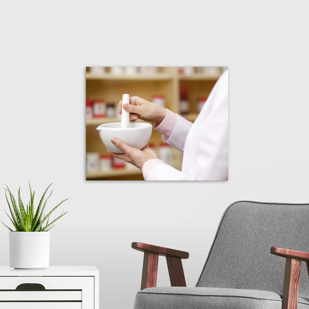 A modern room featuring Pharmacist using mortar and pestle