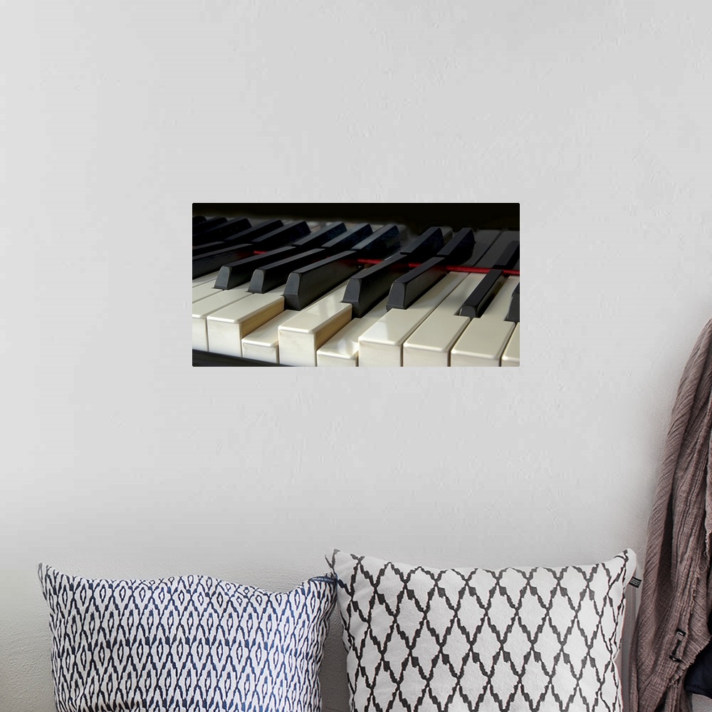 A bohemian room featuring Piano keyboard.