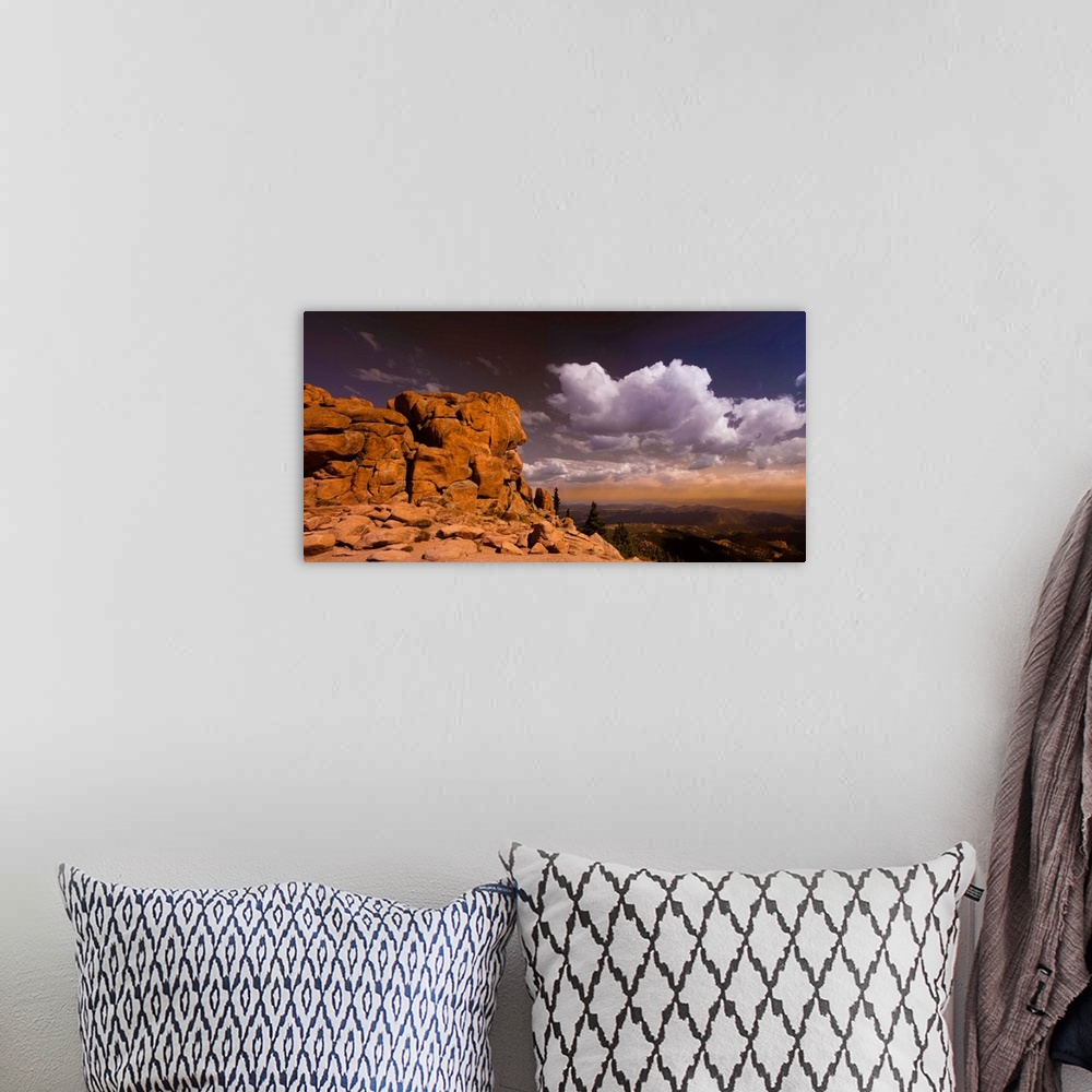 A bohemian room featuring Pikes Peak is mountain in Front Range of Rocky Mountains.