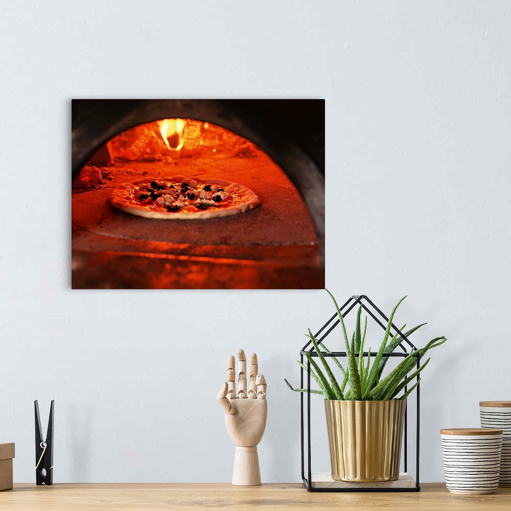 A bohemian room featuring Pizza baking in the forno