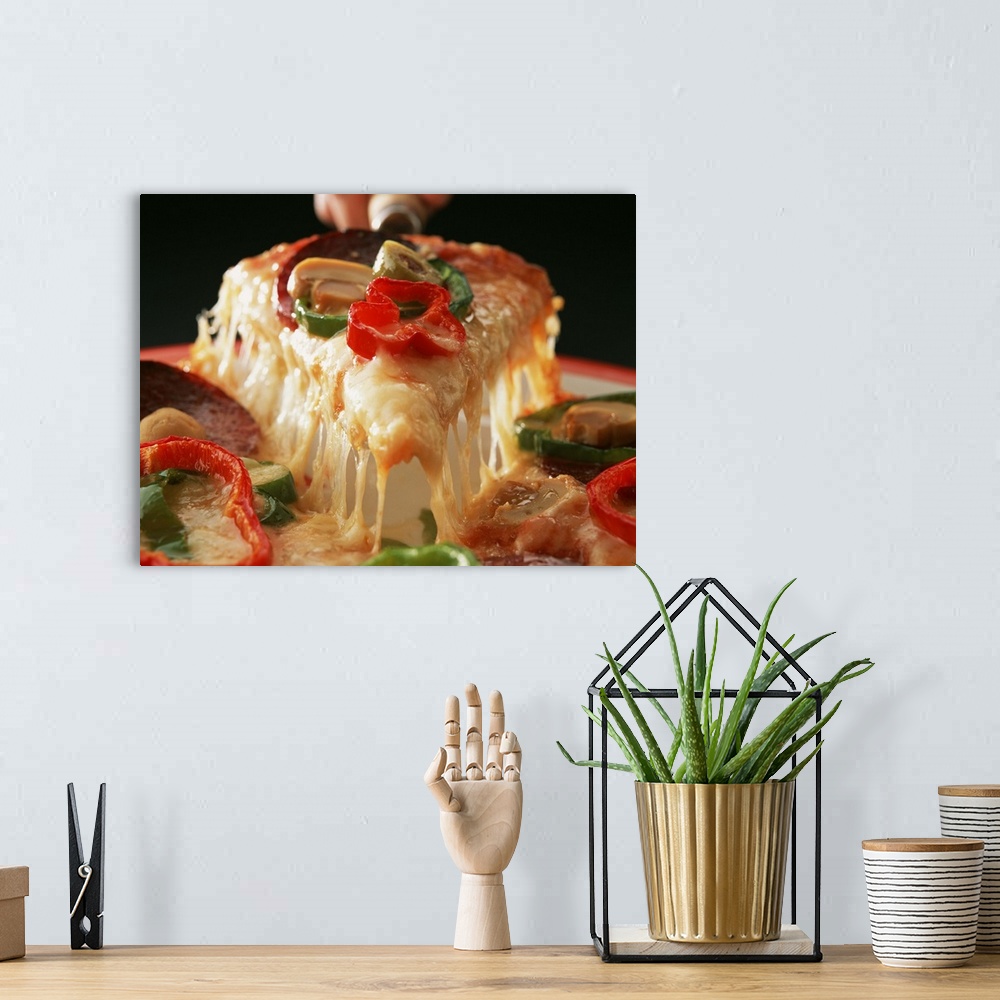 A bohemian room featuring Pizza with bell peppers