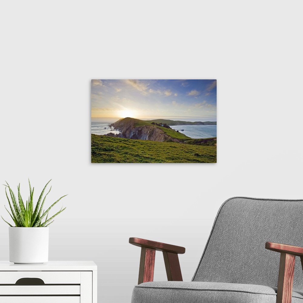 A modern room featuring Point Reyes National Seashore at sunset on the northern California coast, USA.