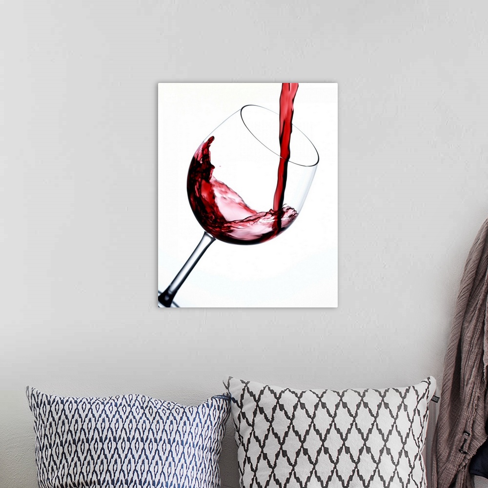 A bohemian room featuring Pouring Red Wine Into Wine Glass