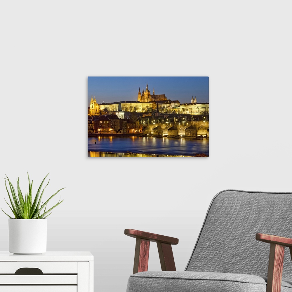 A modern room featuring Prague - Charles Bridge, Hradcany Castle, St. Vitus Cathedral at dusk.