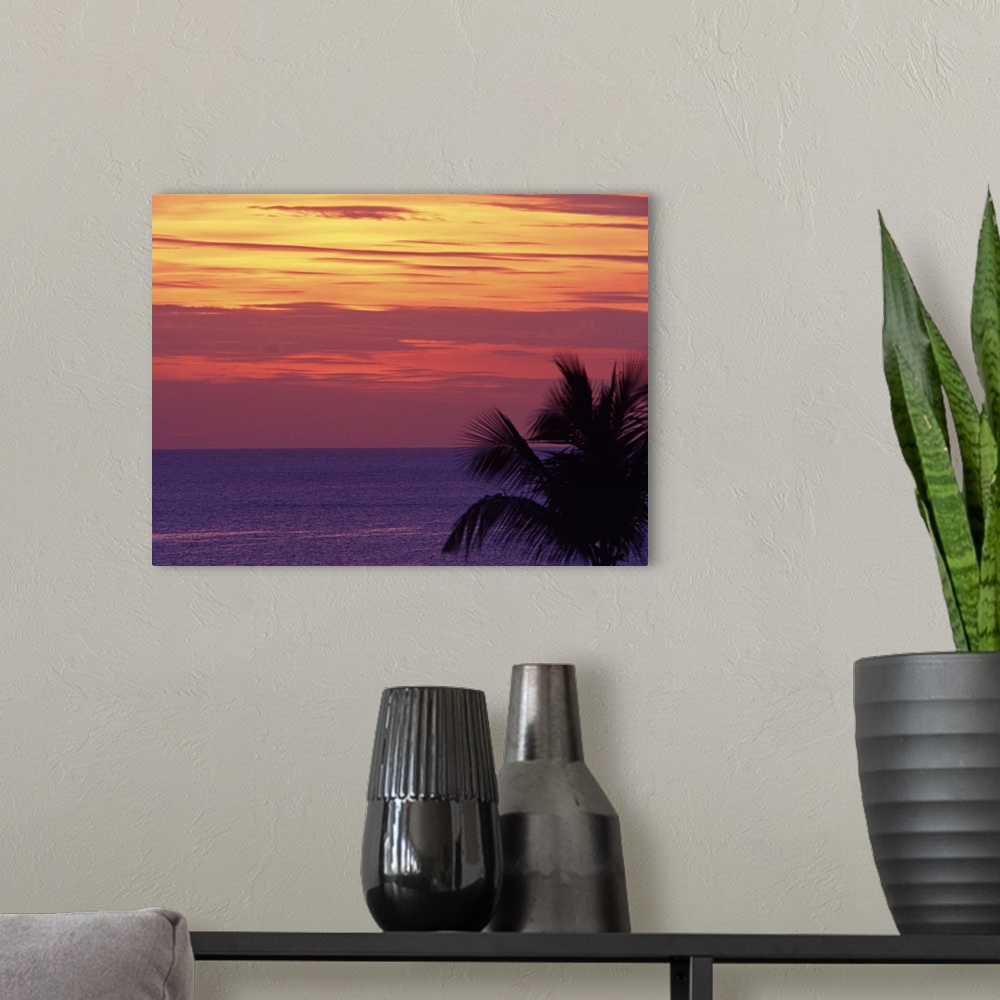 A modern room featuring Purple sea with orange sunset