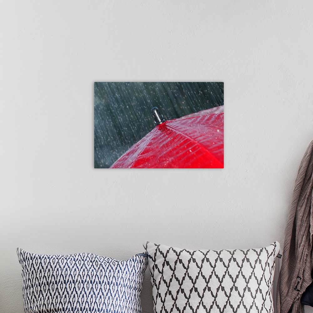 A bohemian room featuring Rain falling on umbrella