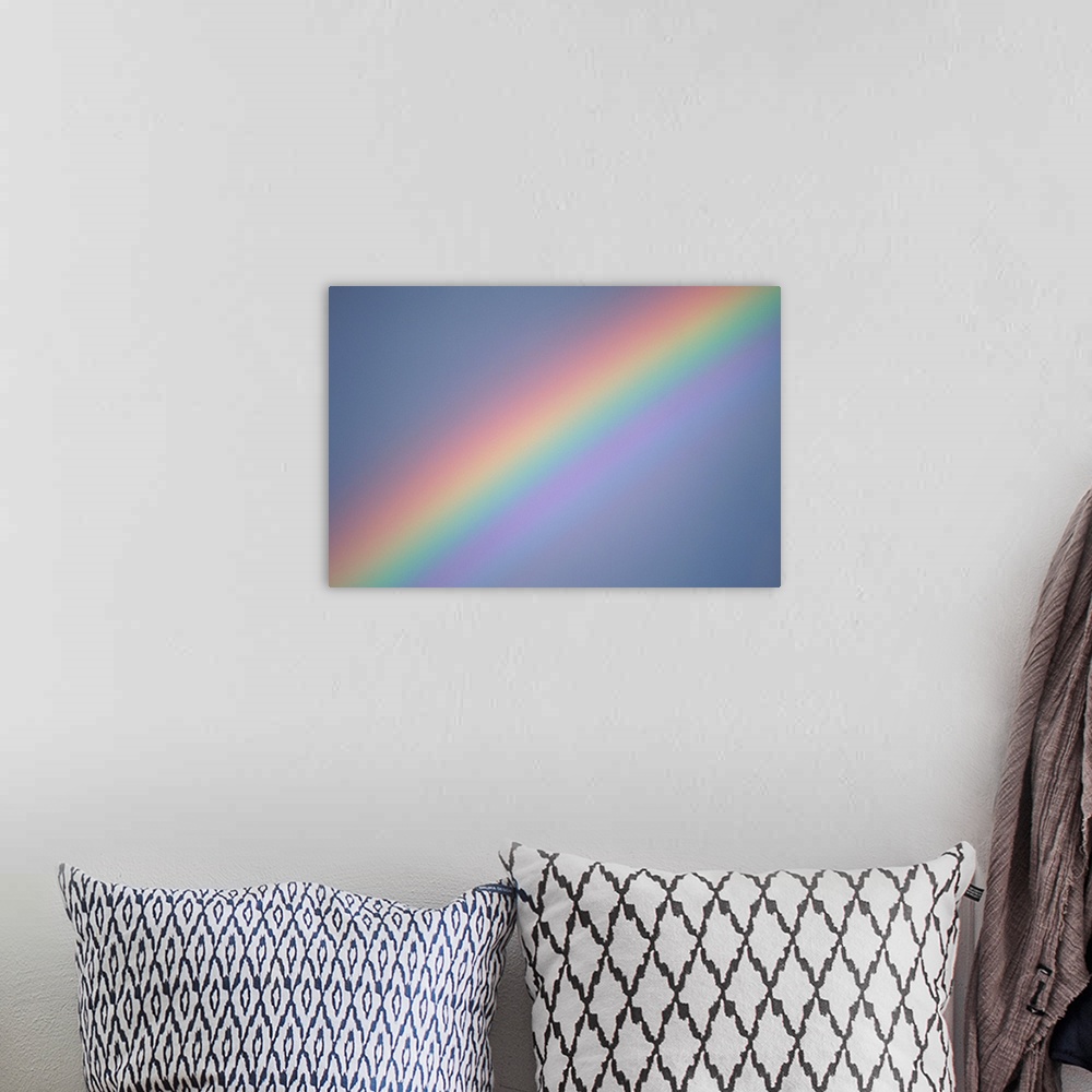 A bohemian room featuring Rainbow in sky